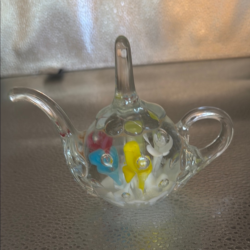 Joe StClaire Glass Teapot Paperweight and ring holder is bursting with color.